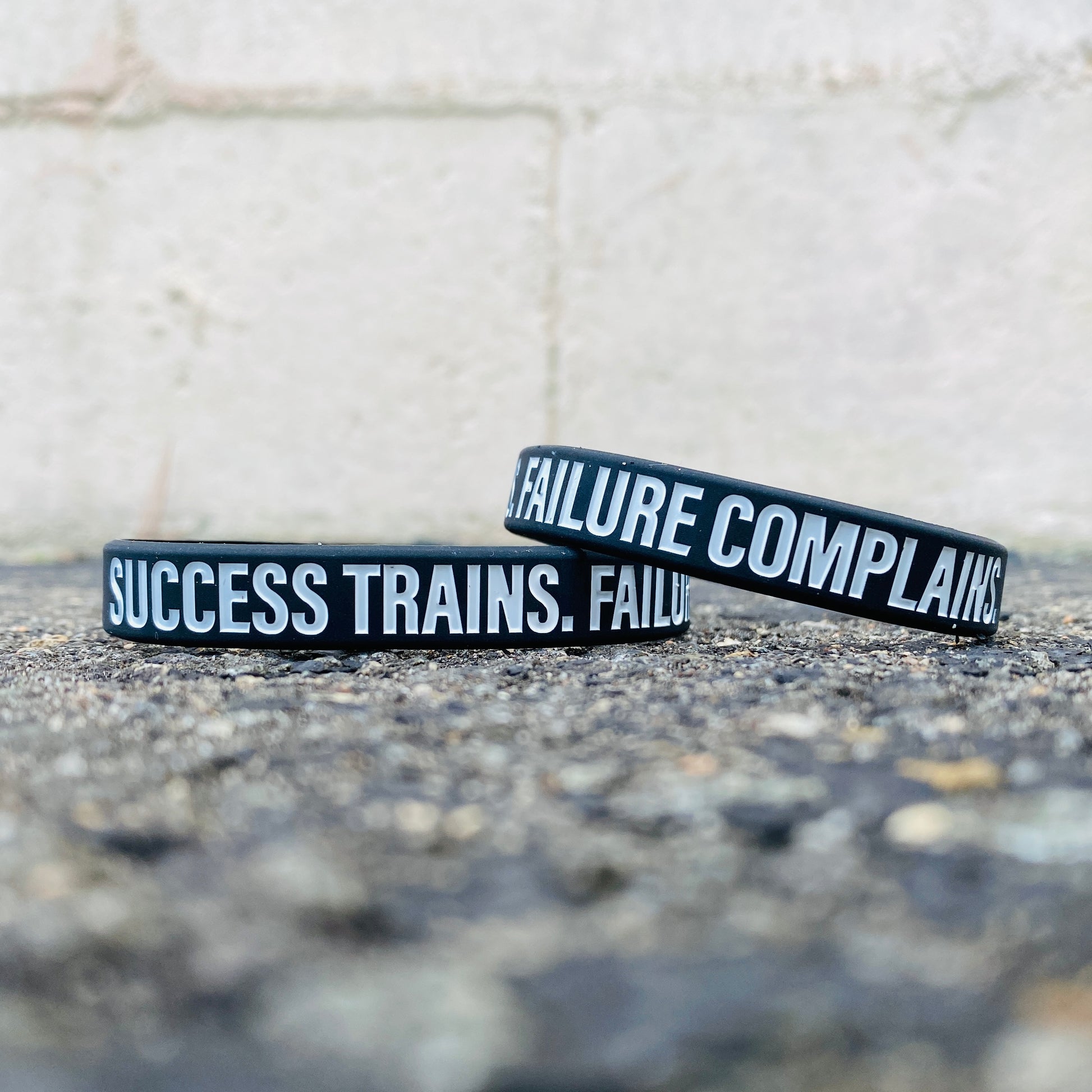SUCCESS TRAINS. FAILURE COMPLAINS. Wristband